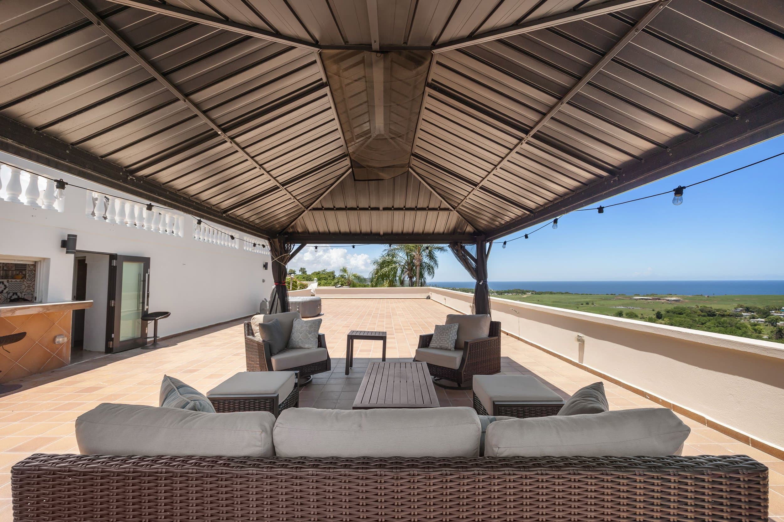 Poolside lounge under the pergola