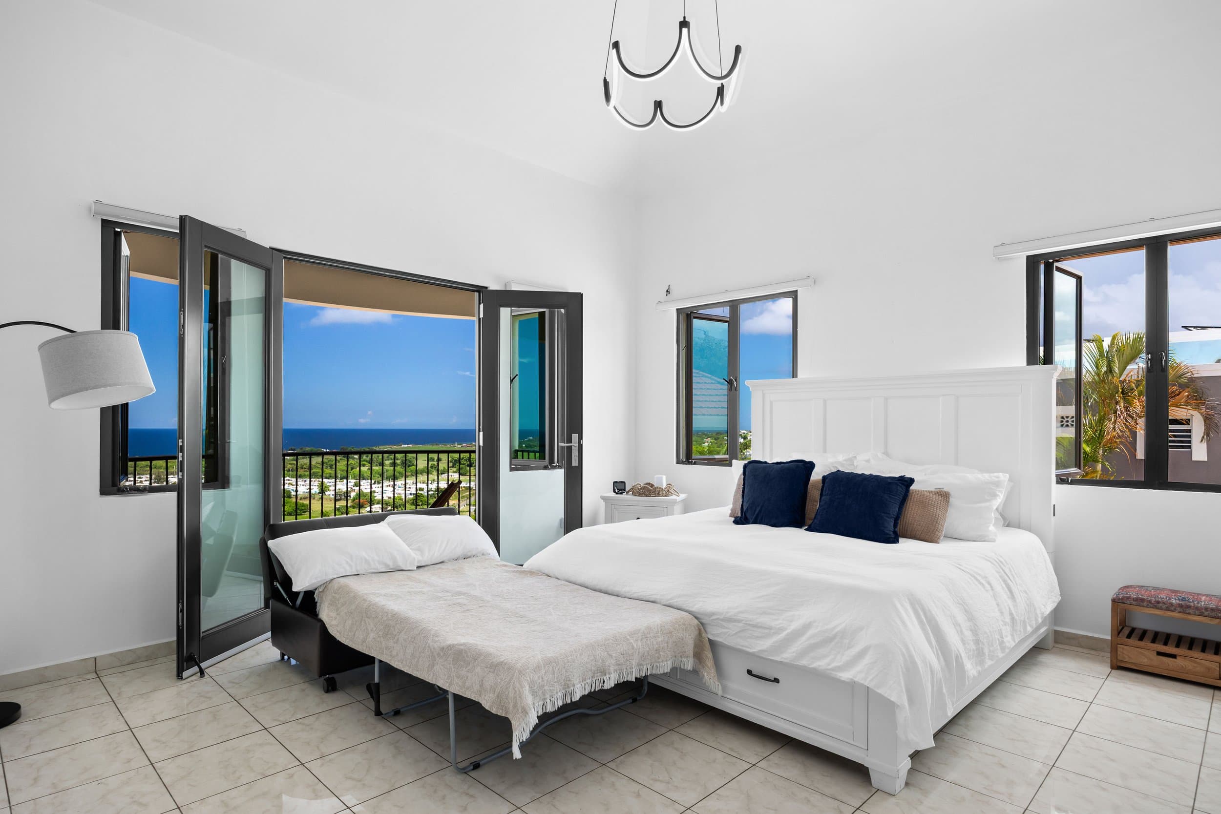Bright bedroom with ocean breeze