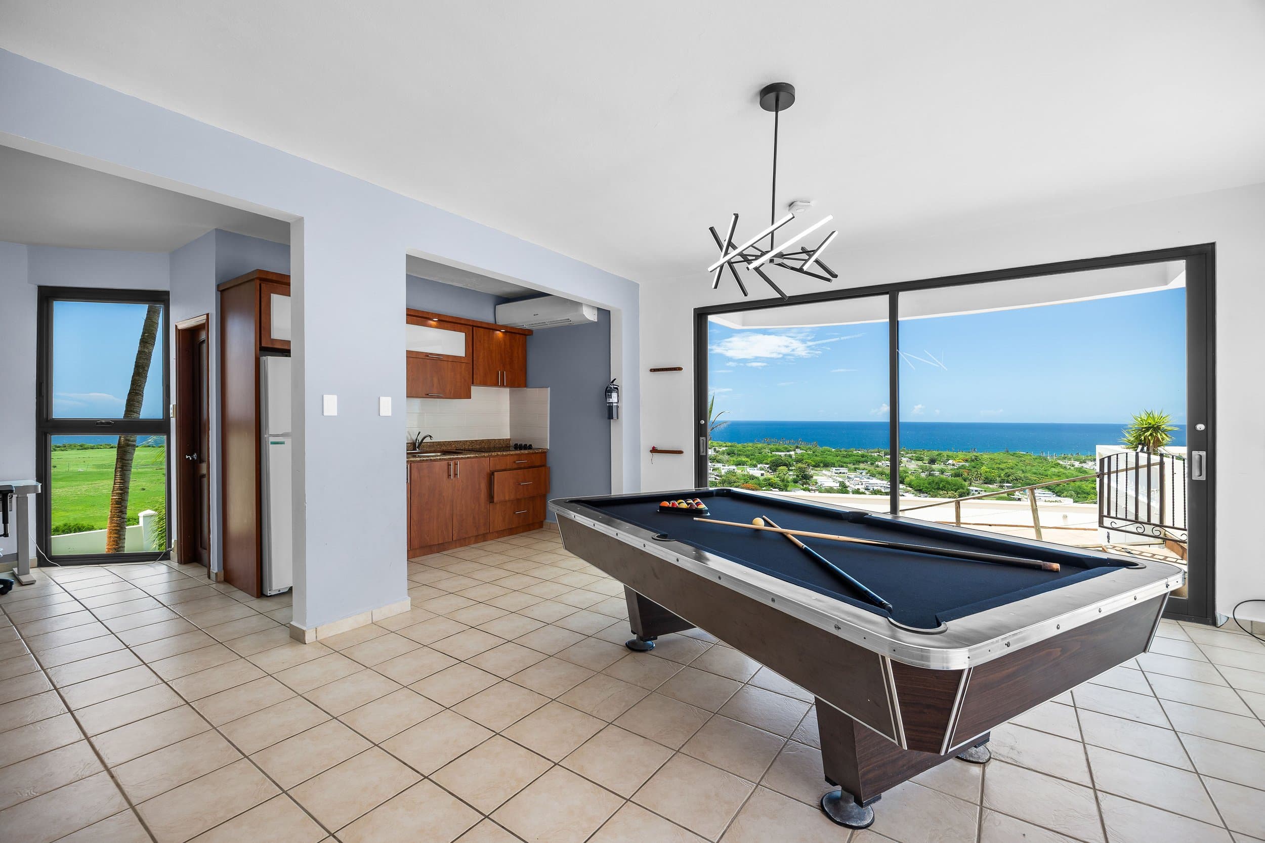 Pool table under the vaulted ceiling