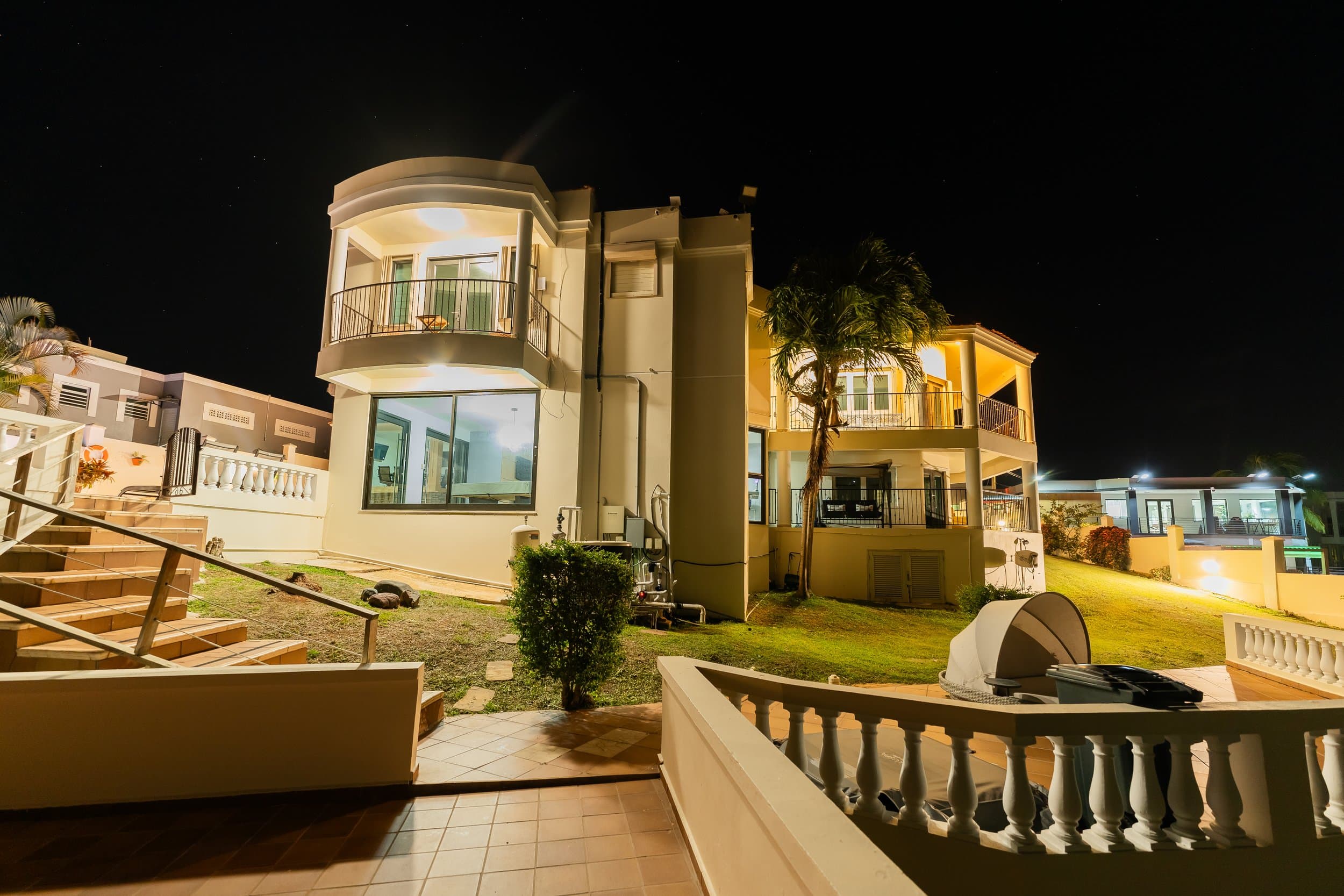 Casa Nakhla lit up at night
