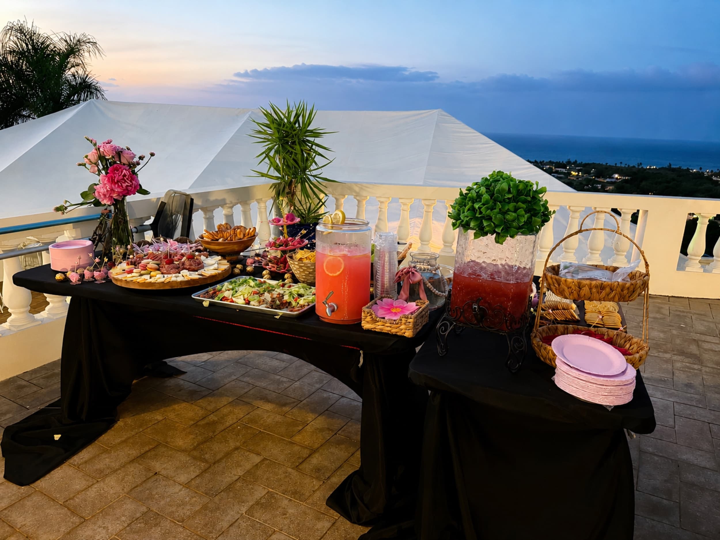 Catered spread and agua frescas on the terrace