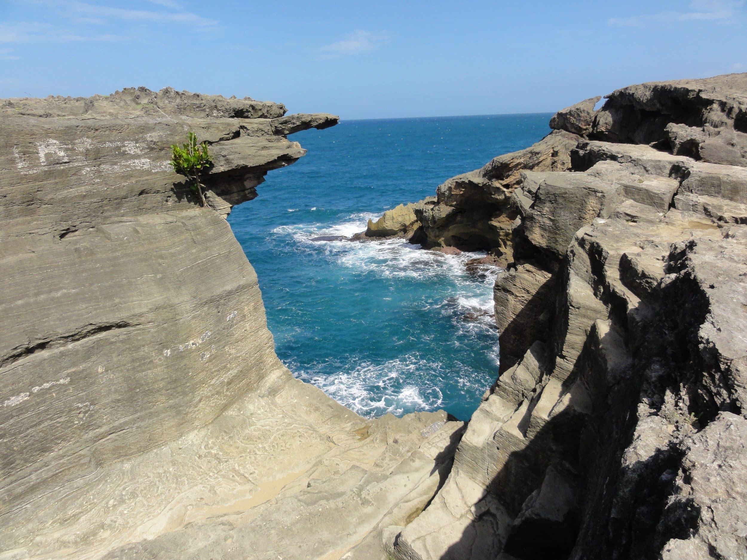 The karst cliffs and sea cave at Cueva del Indio, Arecibo