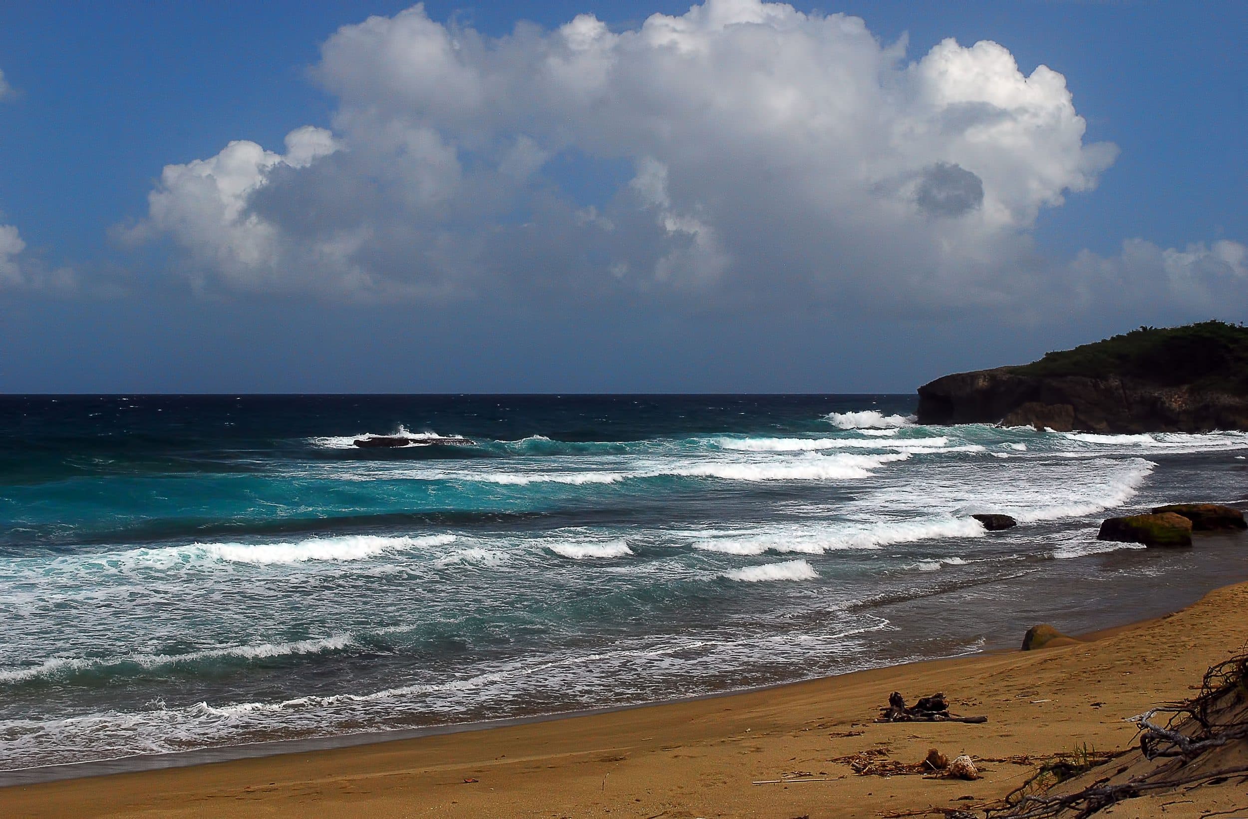 Surf rolling into Jobos Beach, Isabela, Puerto Rico