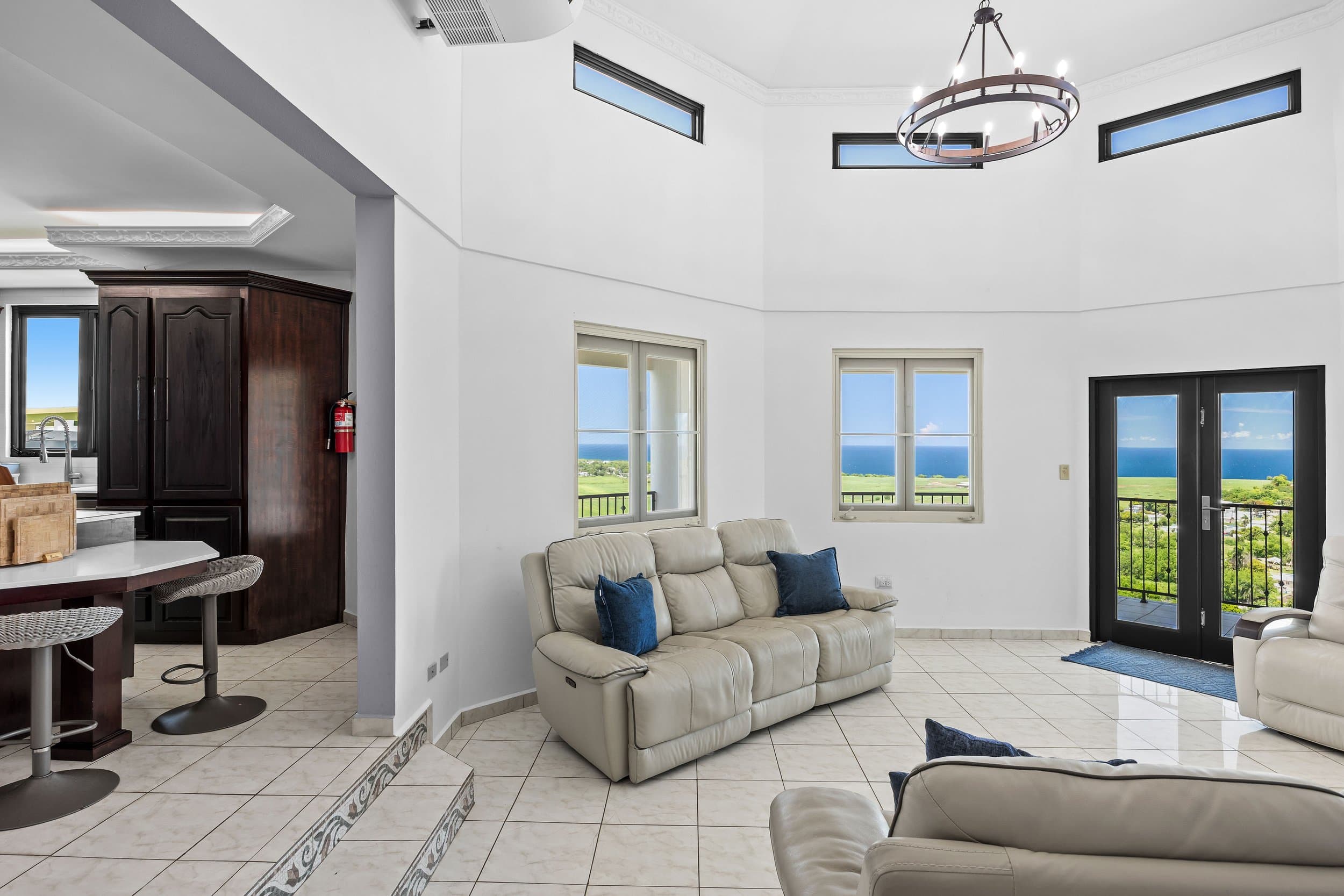 Living room with theater seating under the cupola